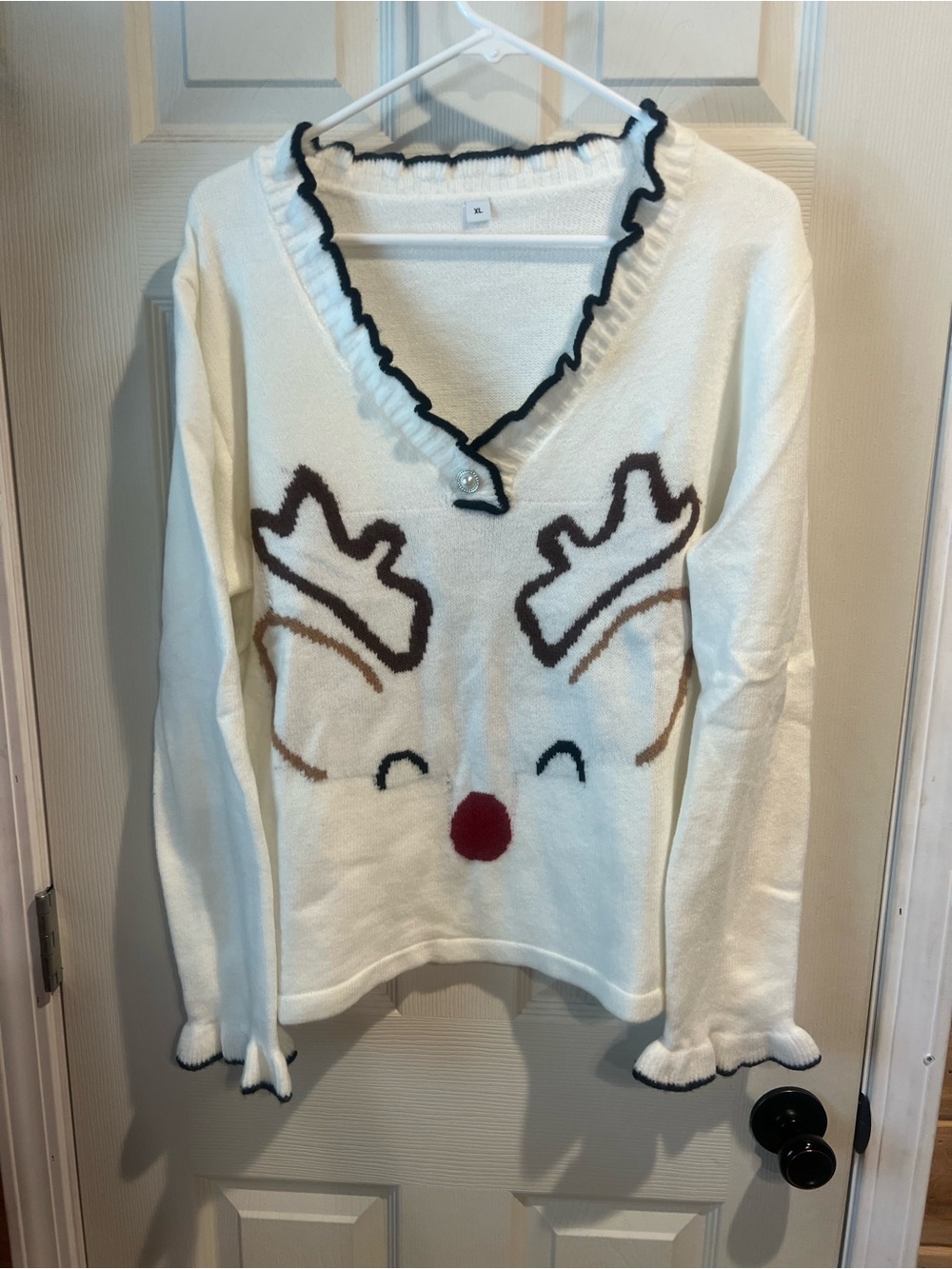 Unk Cream Reindeer V-Neck Sweater with Red Nose and Brown Antlers